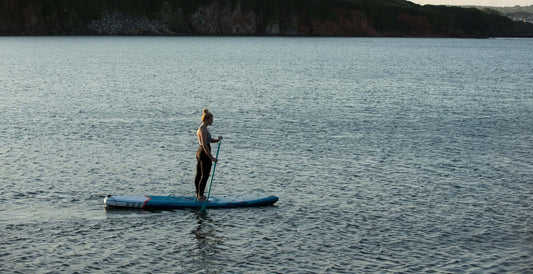 woman paddleboarding - Brooklyn Kayak Company