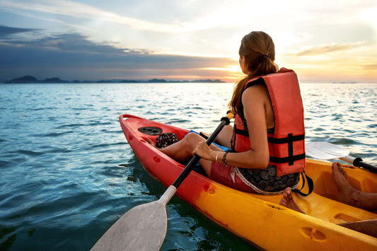 woman paddle kayaking