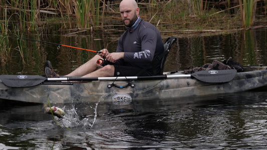 man kayak fishing