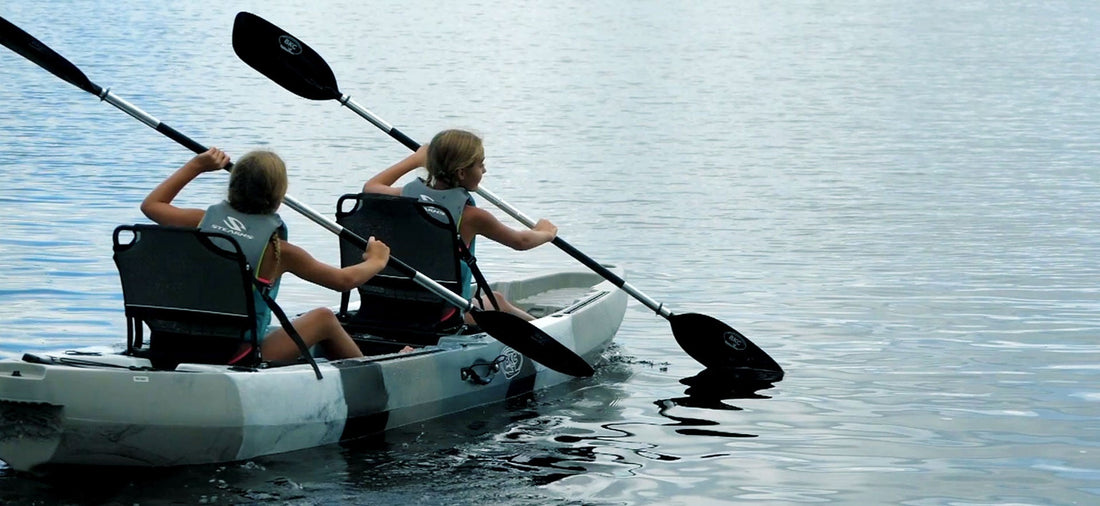 people paddling a 2 person kayak - Brooklyn Kayak Company