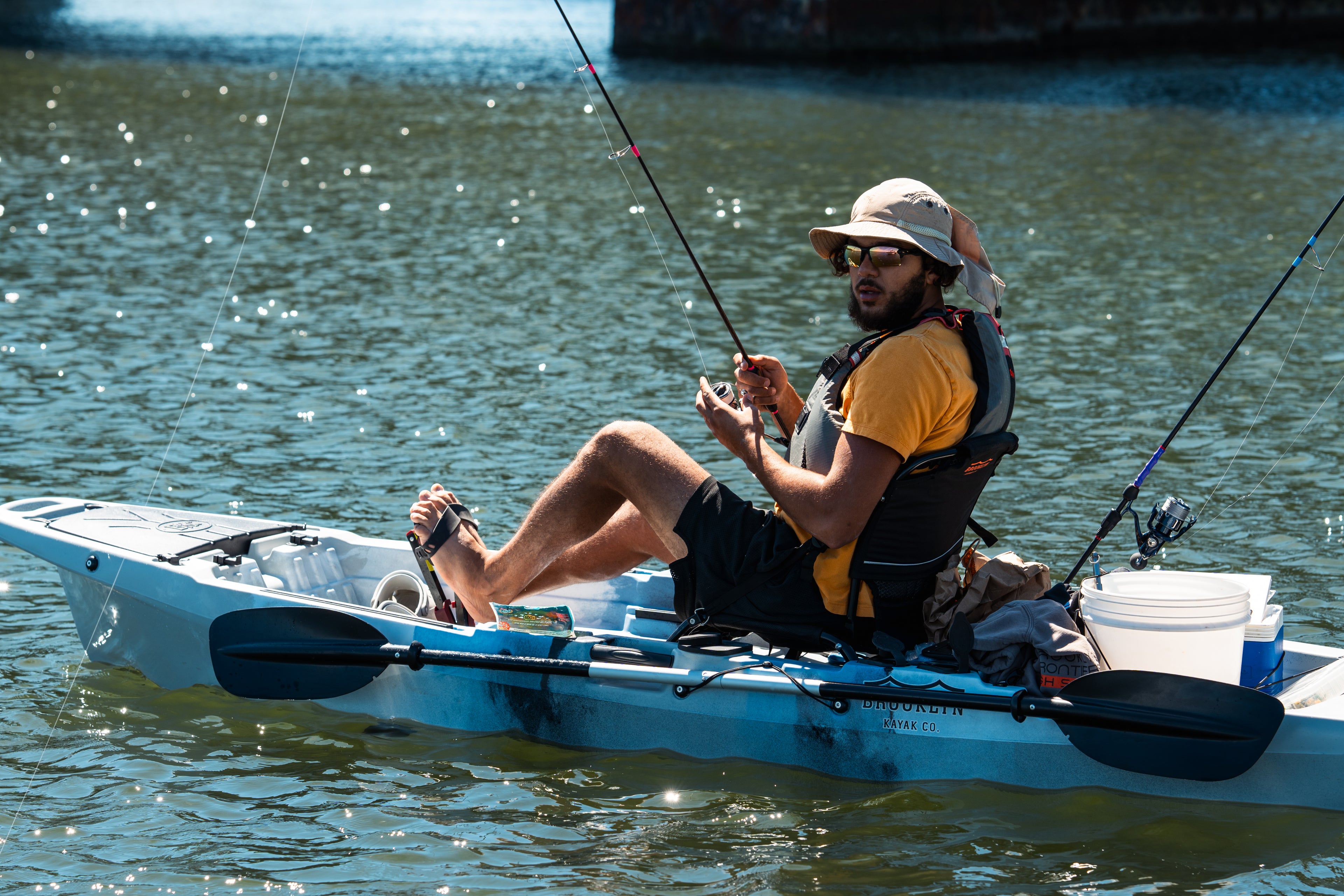 angler on a BKC single pedal kayak - Brooklyn Kayak Company