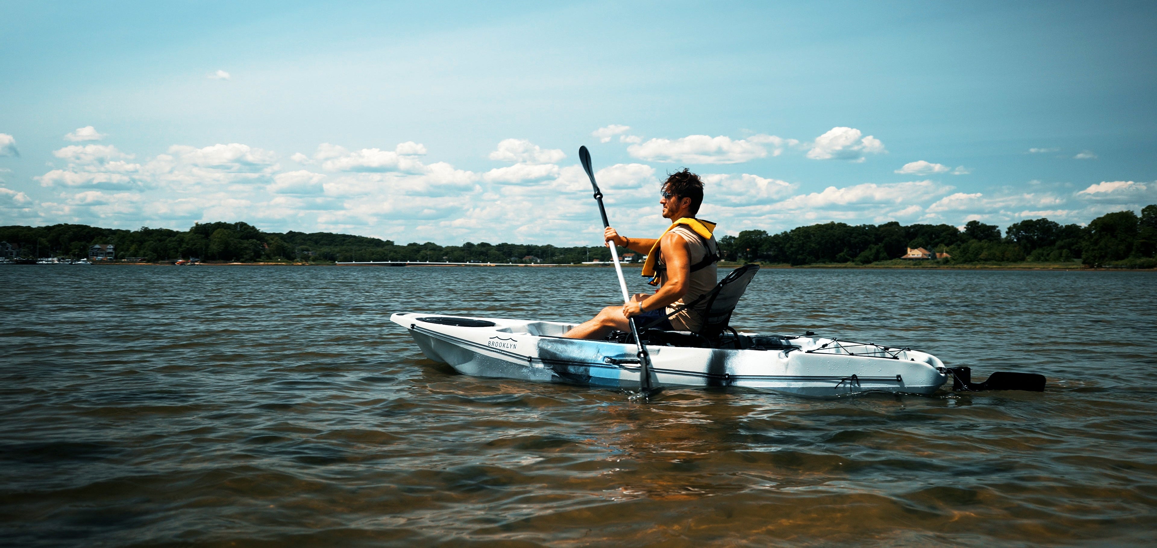 man paddling a single kayak - Brooklyn Kayak Company
