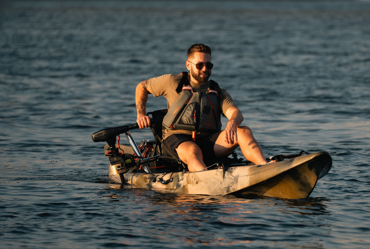 man cruising on a BKC motorized kayak - Brooklyn Kayak Company