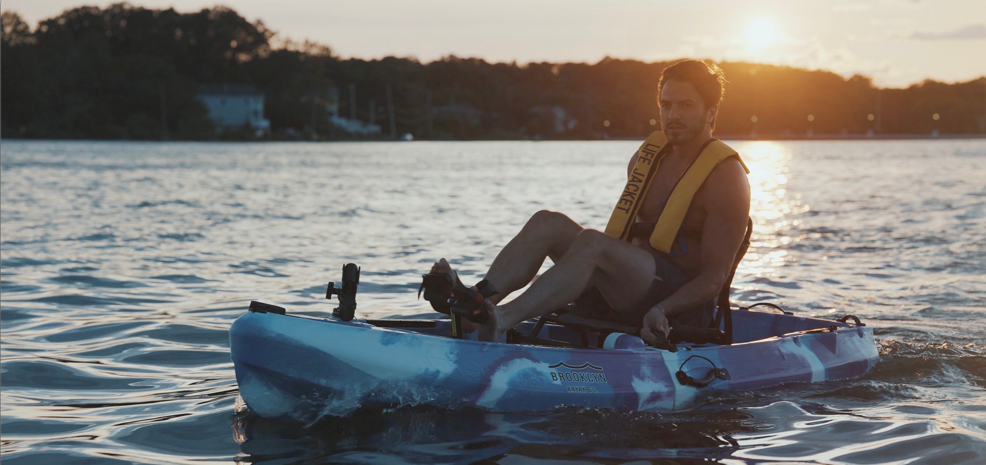 man on pedal kayak at sunset - Brooklyn Kayak Company