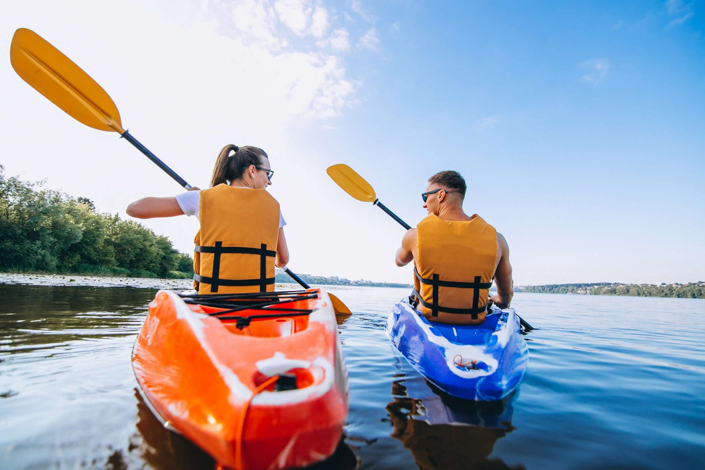 couple kayaking in river - Brooklyn Kayak Company