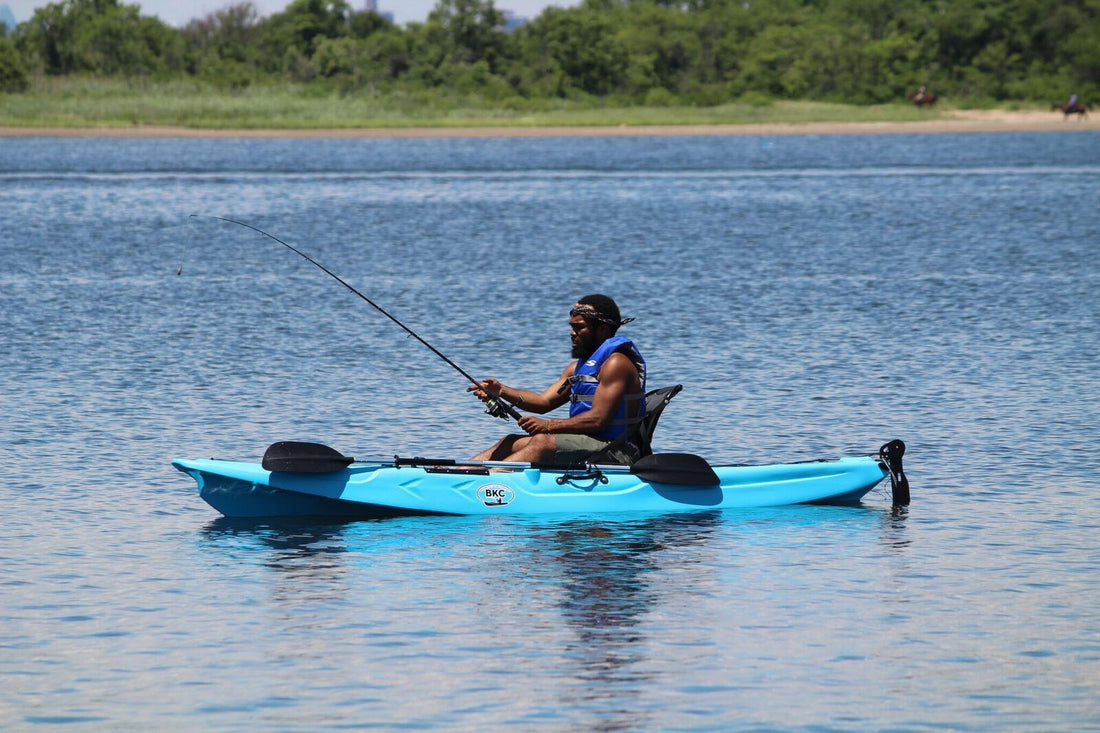 person kayak fishing