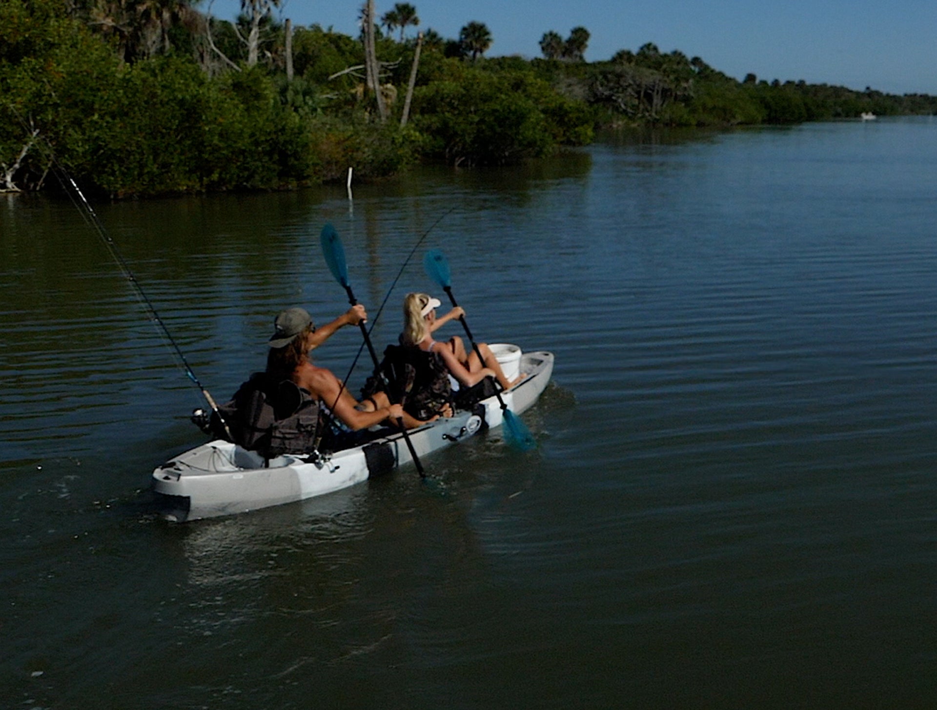 couple paddling a tandem fishing kayak - Brooklyn Kayak Company