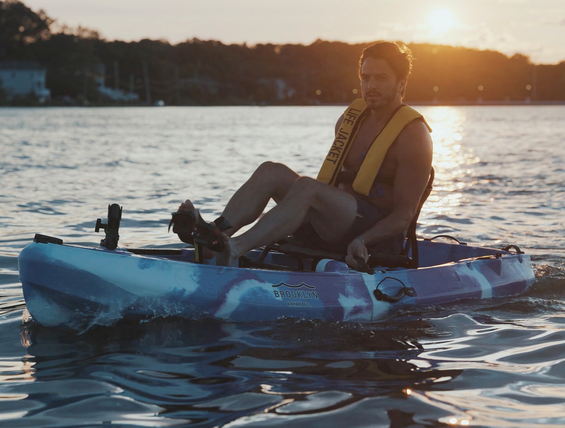 man pedaling 8.0 single foldable kayak - Brooklyn Kayak Company