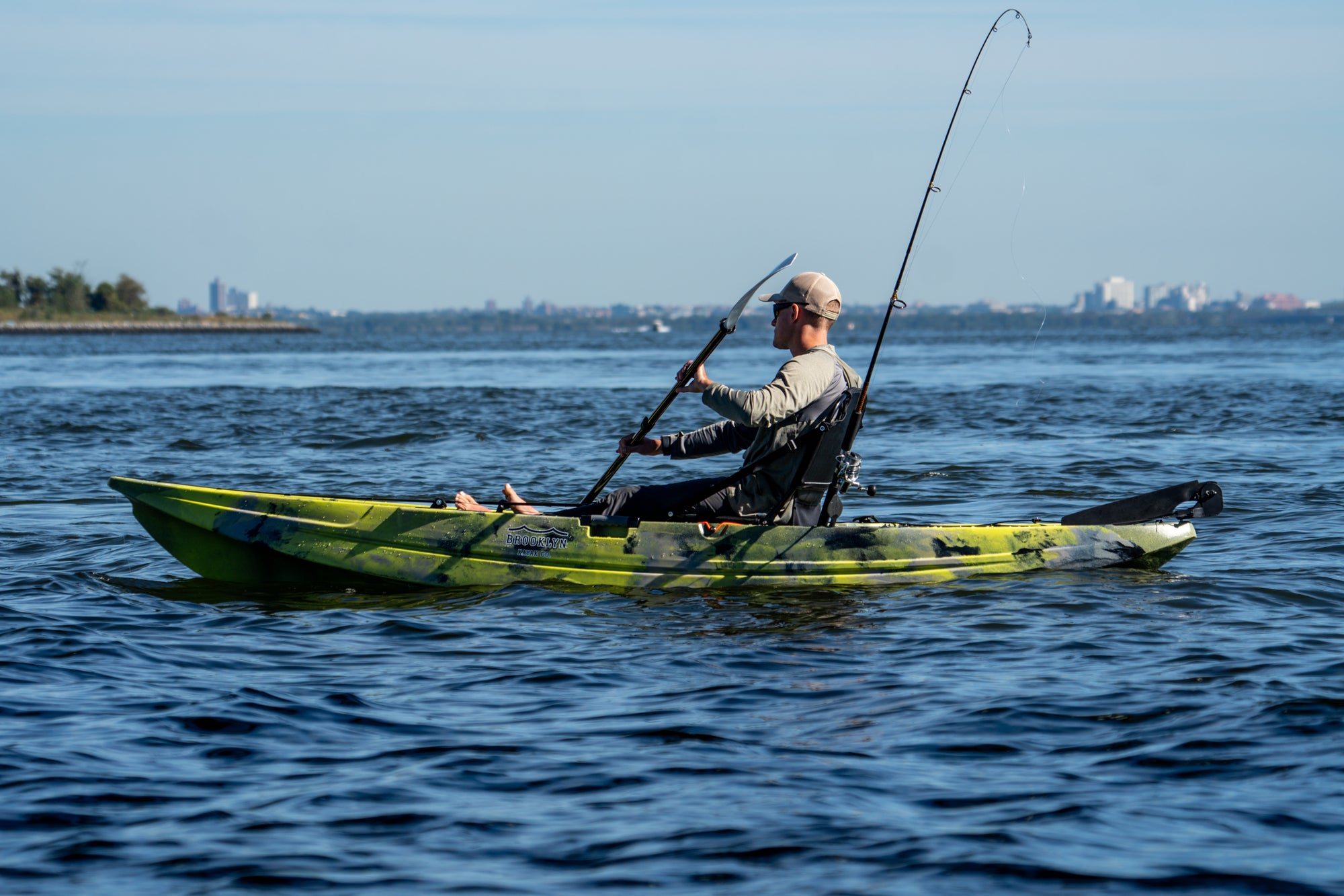 angler paddling a fishing kayak - Brooklyn Kayak Company