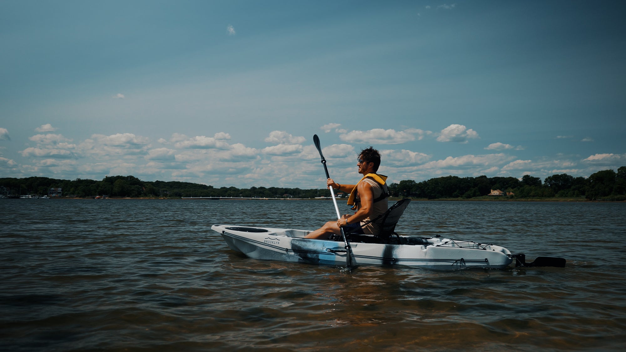man paddling a single kayak - Brooklyn Kayak Company