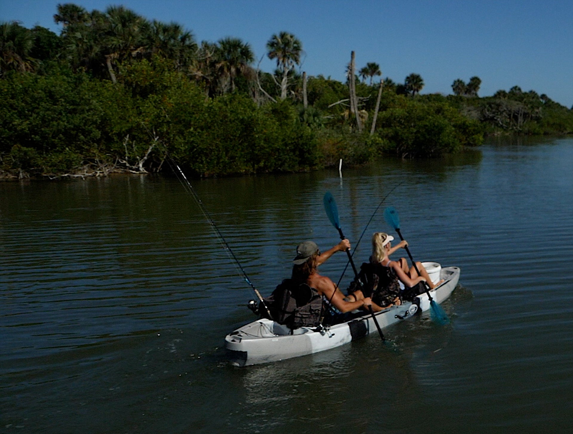 couple paddling a tandem fishing kayak - Brooklyn Kayak Company