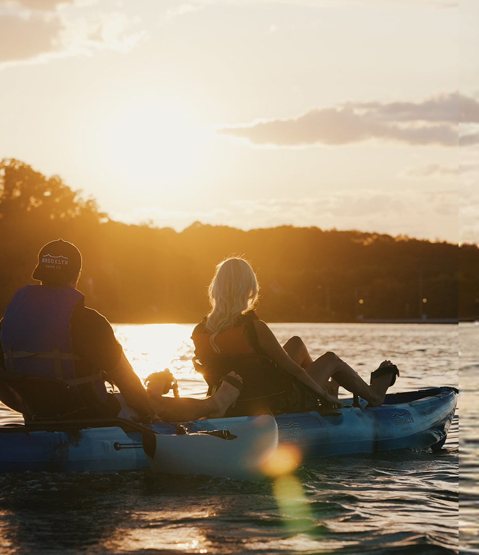 couple at sunset on tandem modular pedal kayak - Brooklyn Kayak Company