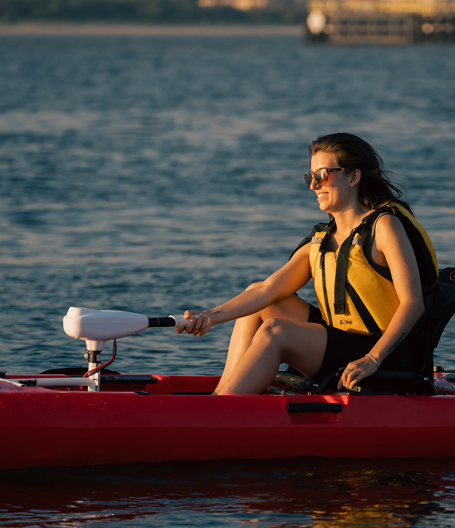 woman angler on motorized fishing kayak closeup - Brooklyn Kayak Company