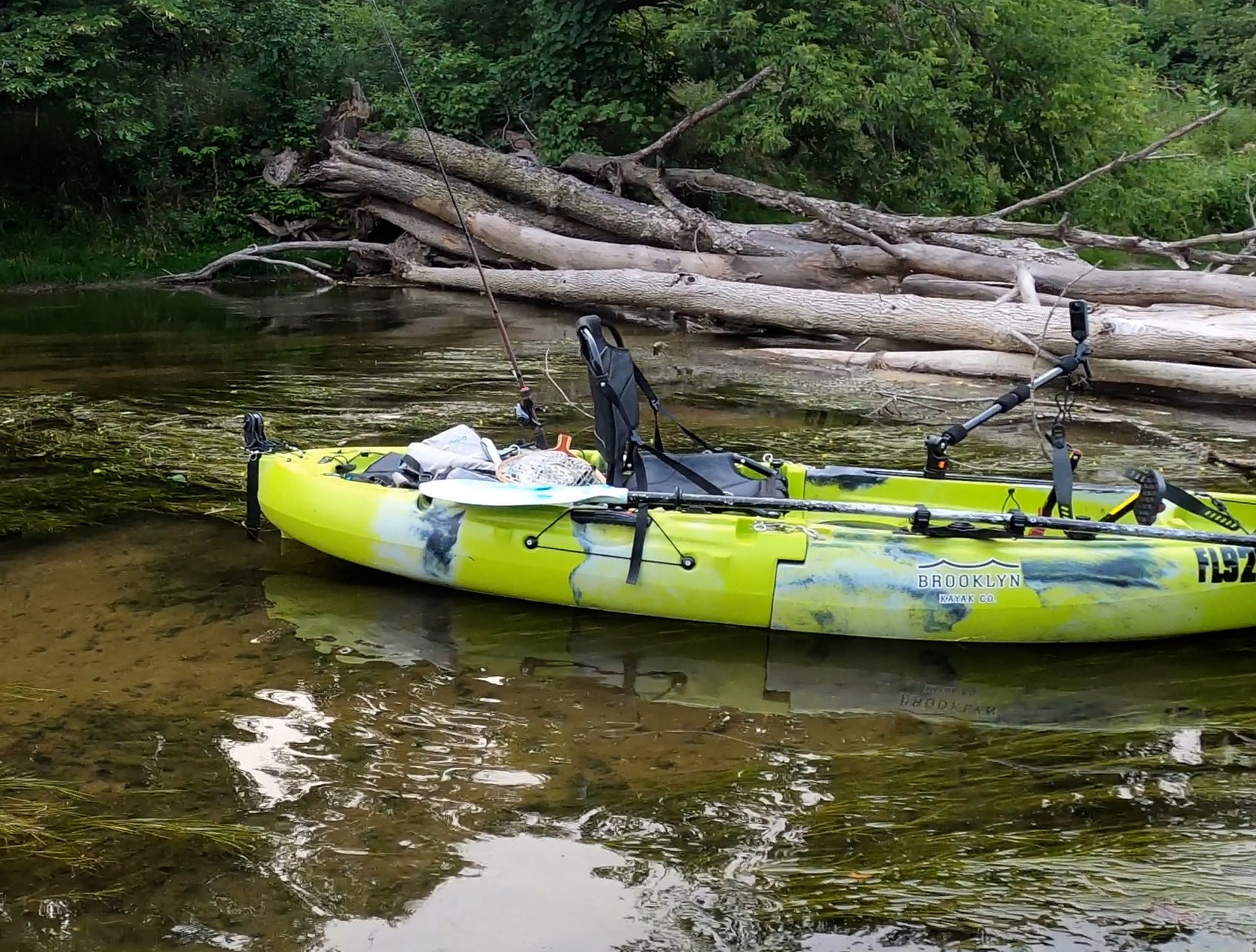 MPK9 Single 2-piece Modular Pedal Kayak, lime camo in river - Brooklyn Kayak Company