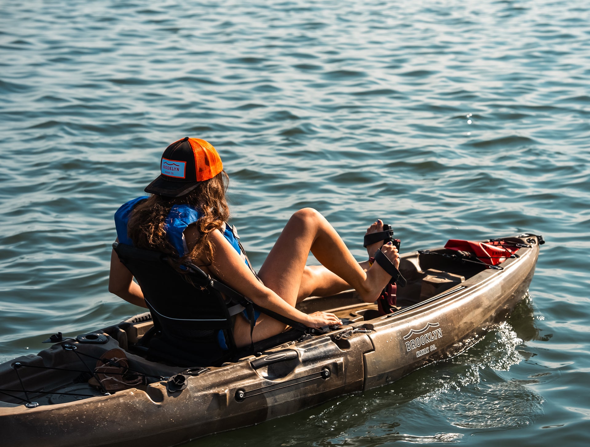 woman on MPK9 Single 2-piece Modular Pedal Kayak - Brooklyn Kayak Company