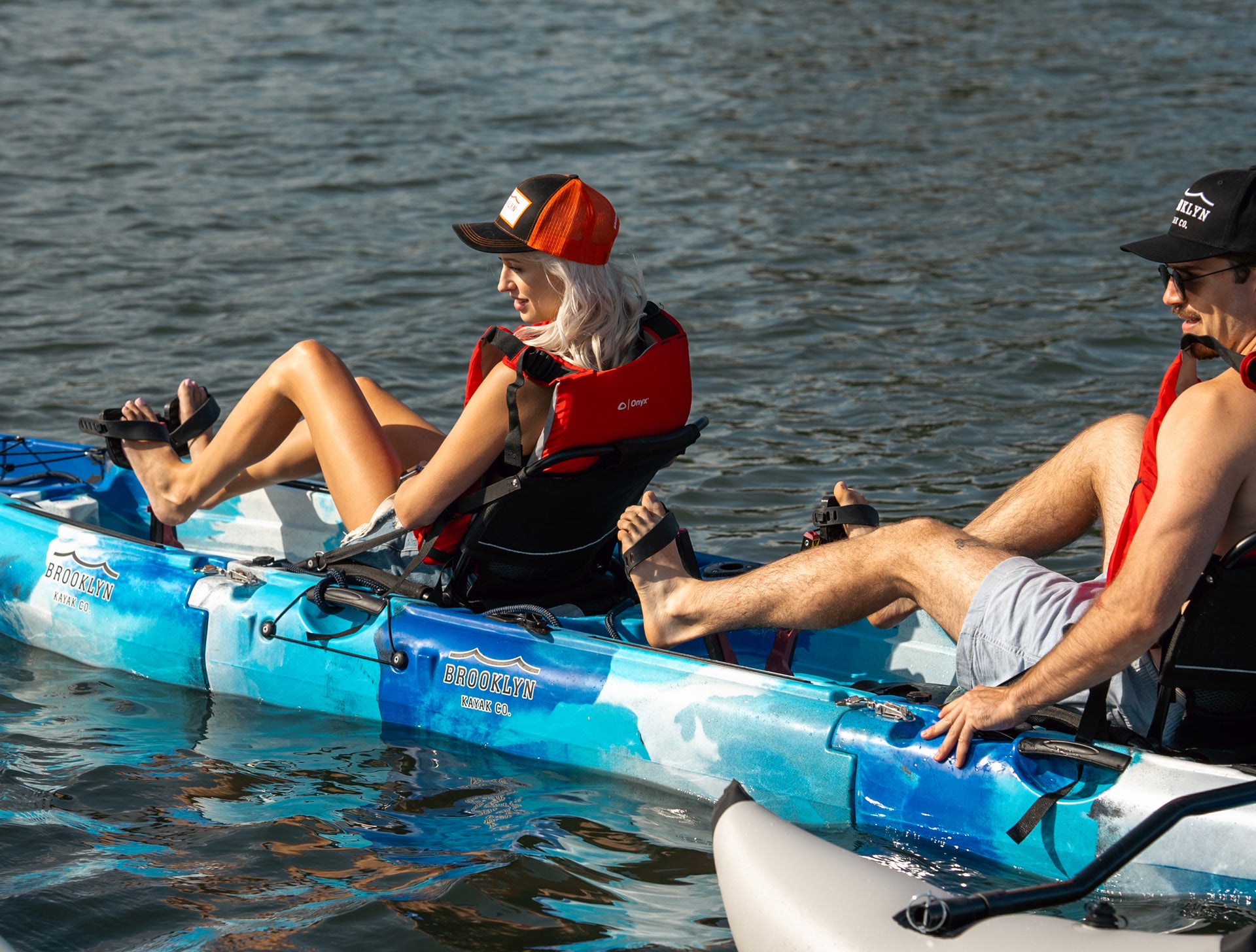 couple on MPT13 Tandem 3-piece Modular Pedal Kayak with outriggers - Brooklyn Kayak Company