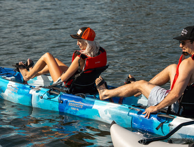 couple on MPT13 Tandem 3-piece Modular Pedal Kayak with outriggers - Brooklyn Kayak Company