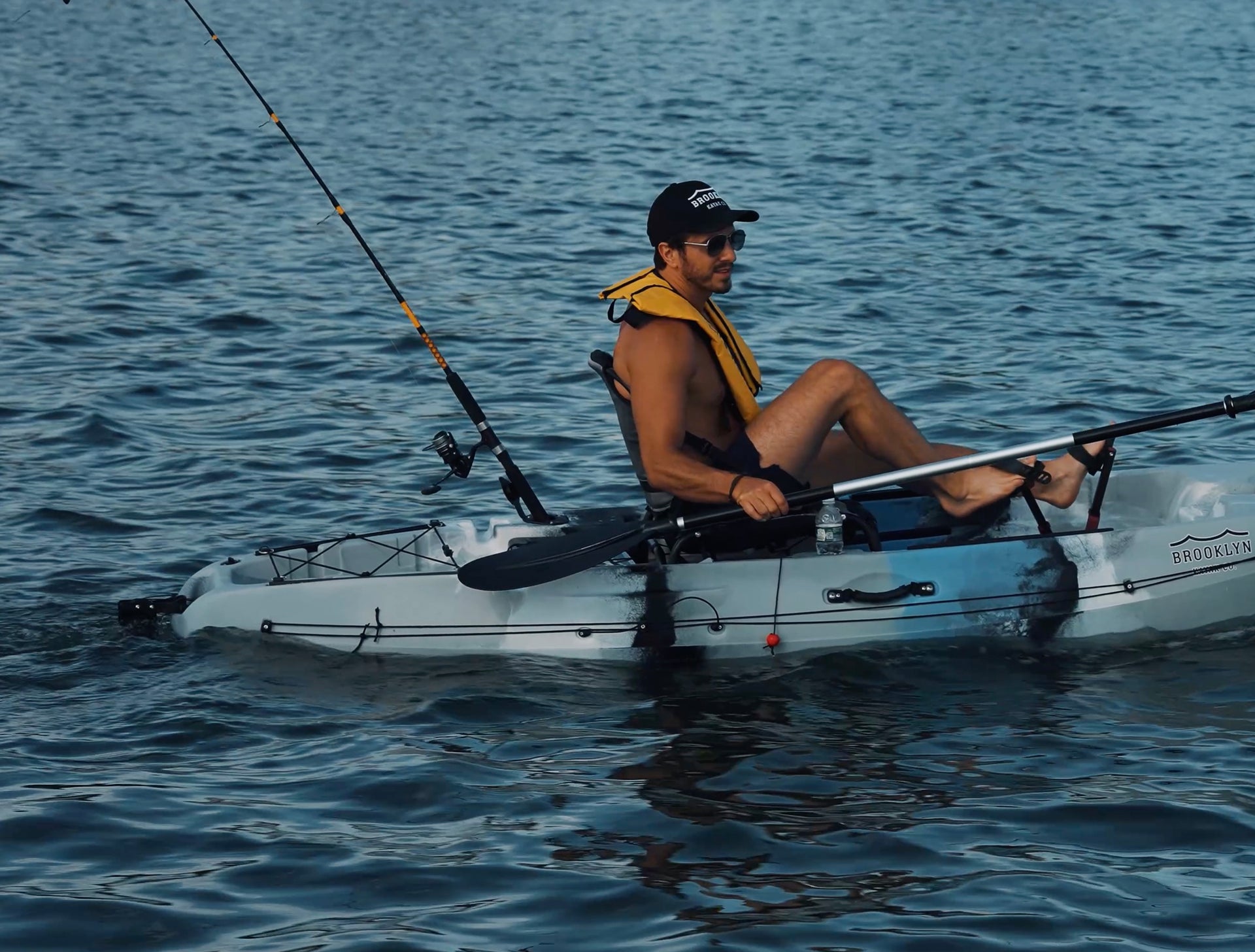 angler on single flipper pedal fishing kayak - Brooklyn Kayak Company