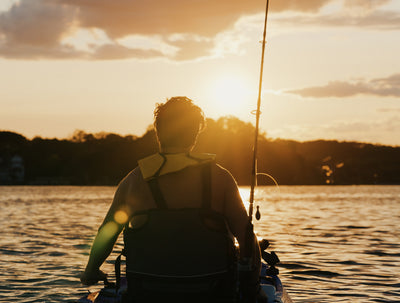 angler at sunset on single fishing kayak - Brooklyn Kayak Company