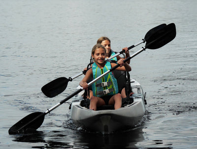 girls paddling a tandem kayak - Brooklyn Kayak Company