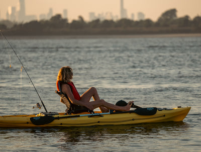 woman angler on single pedal fishing kayak - Brooklyn Kayak Company